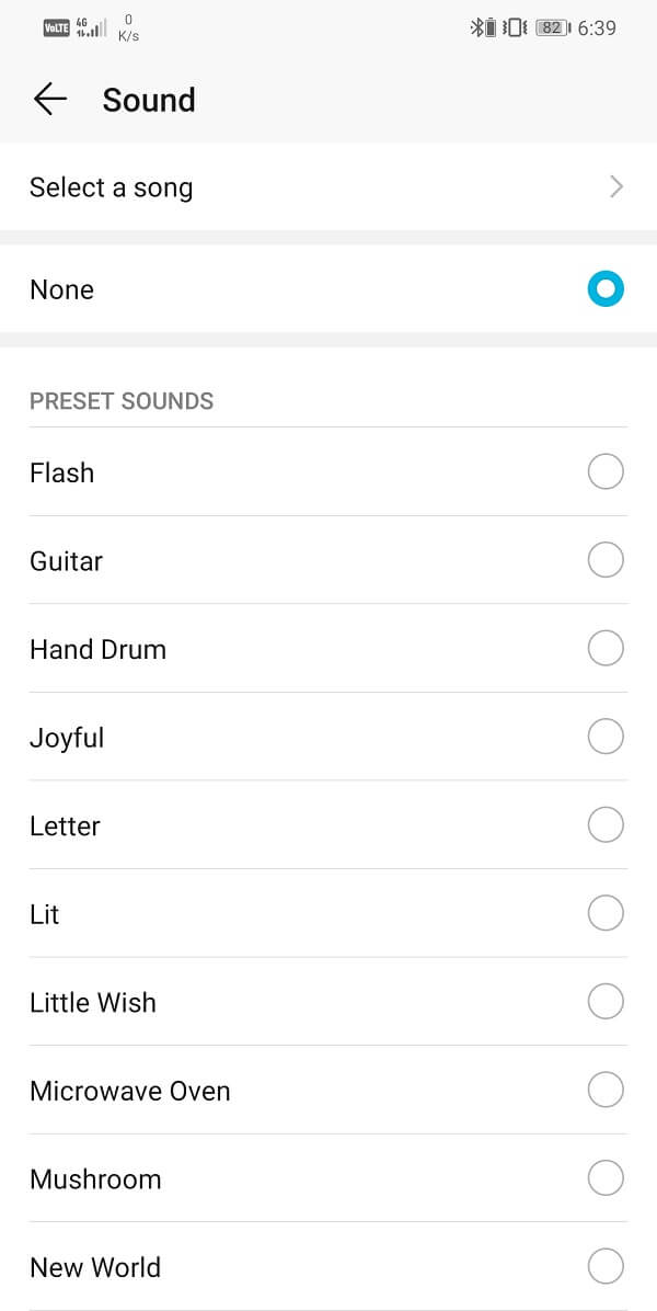 Select None or any of the default system ringtones
